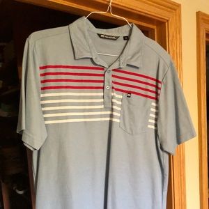 Travis Matthew light blue polo.